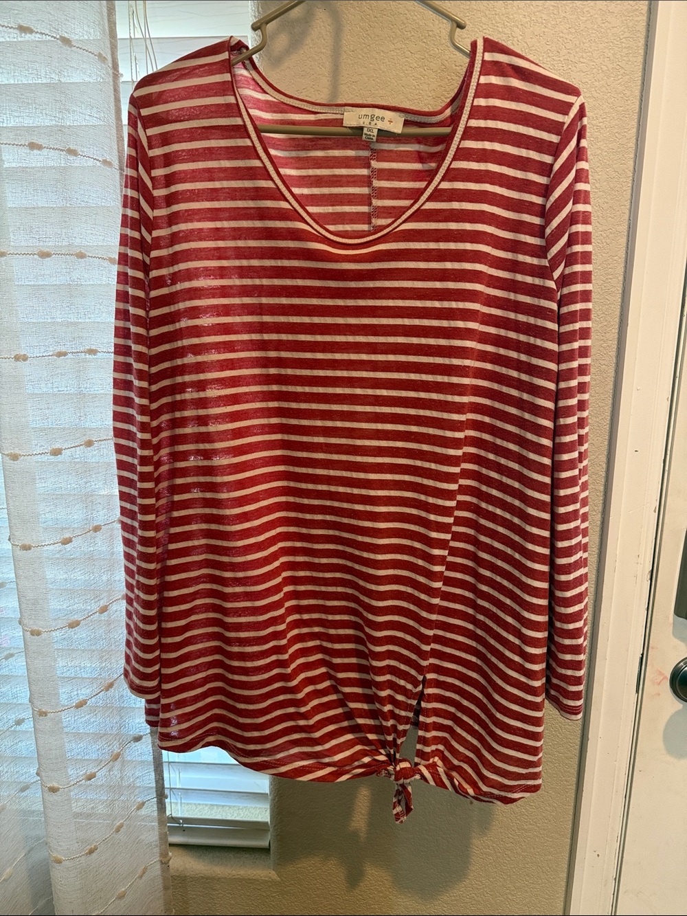 Woman’s Umgee Red and White Striped Long-Sleeve Tie-Hem Top